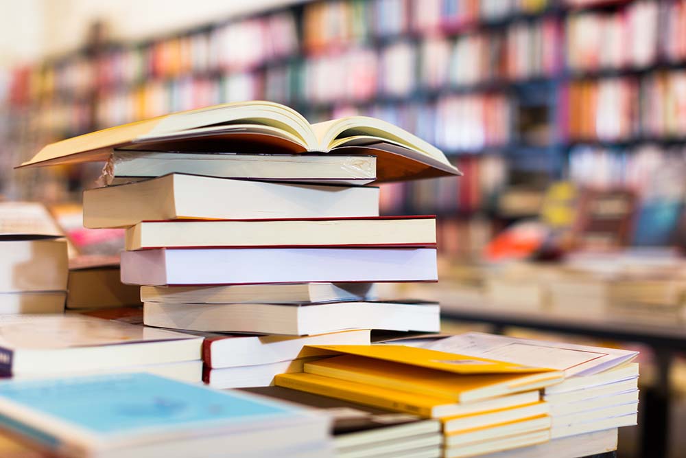 A pile of books in a library